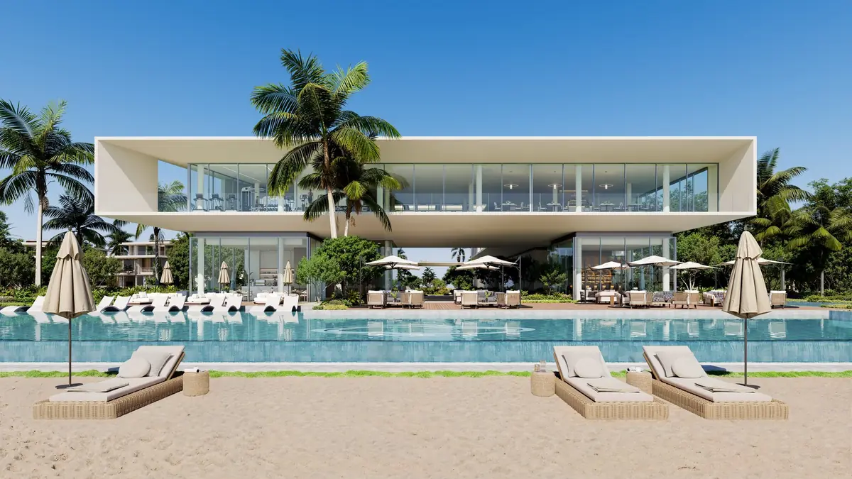 The beach at Bay Estate, with the beach club beyond