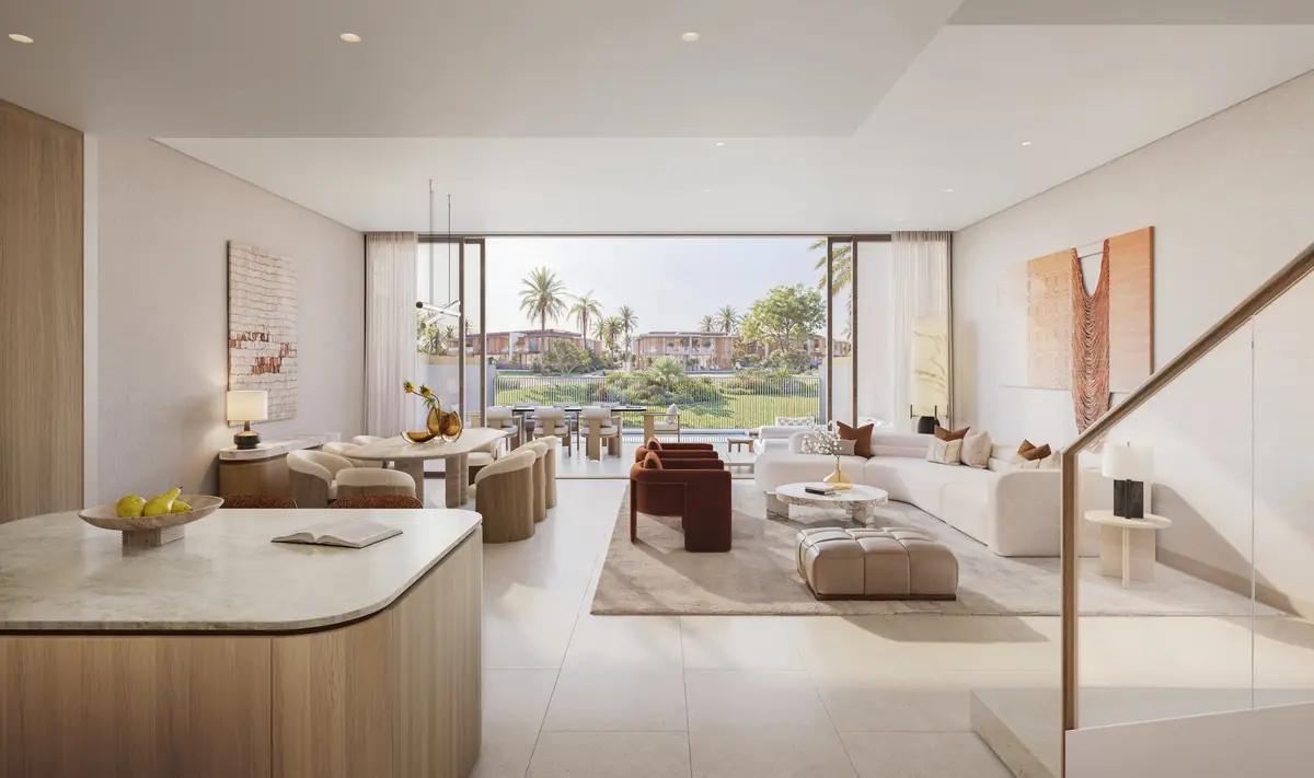 A townhouse living and dining room opening to the garden