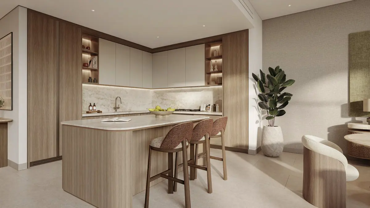 A townhouse kitchen with stone counters and timber joinery