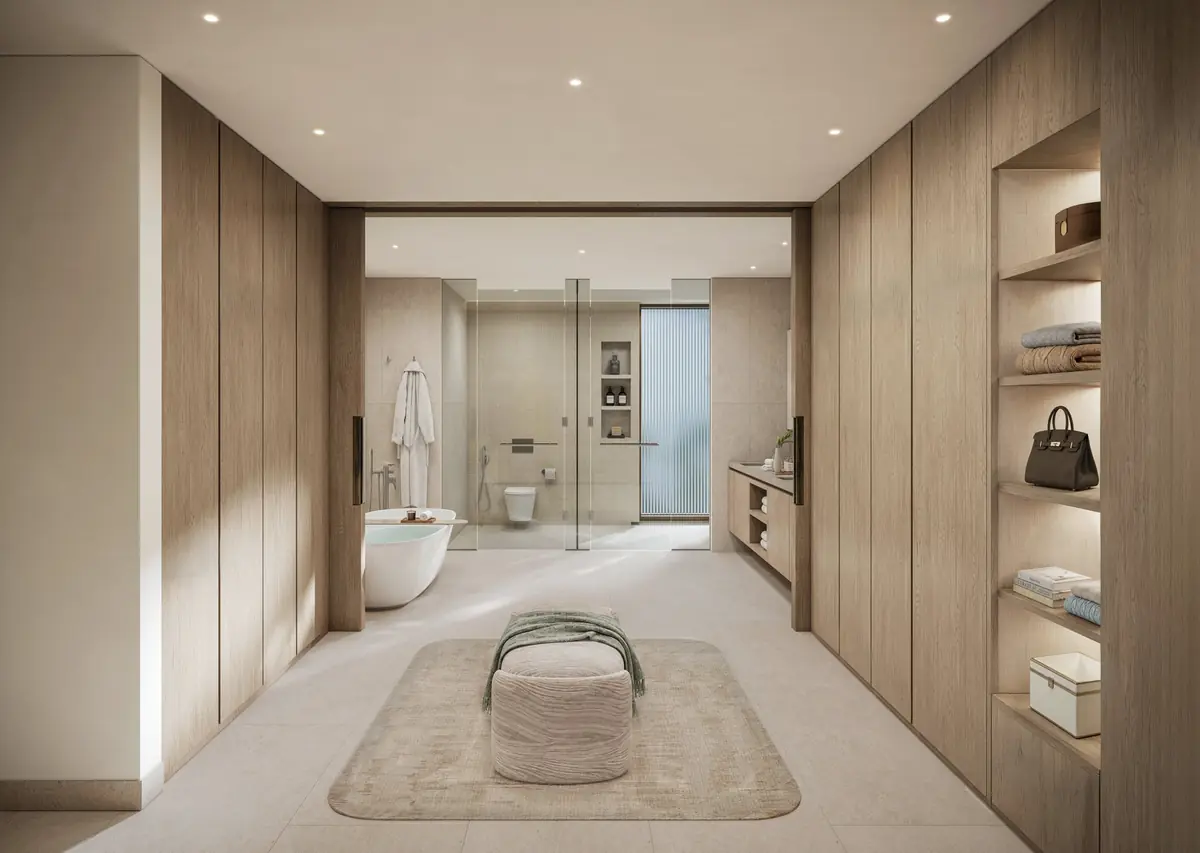 A master bathroom in stone with a freestanding bath