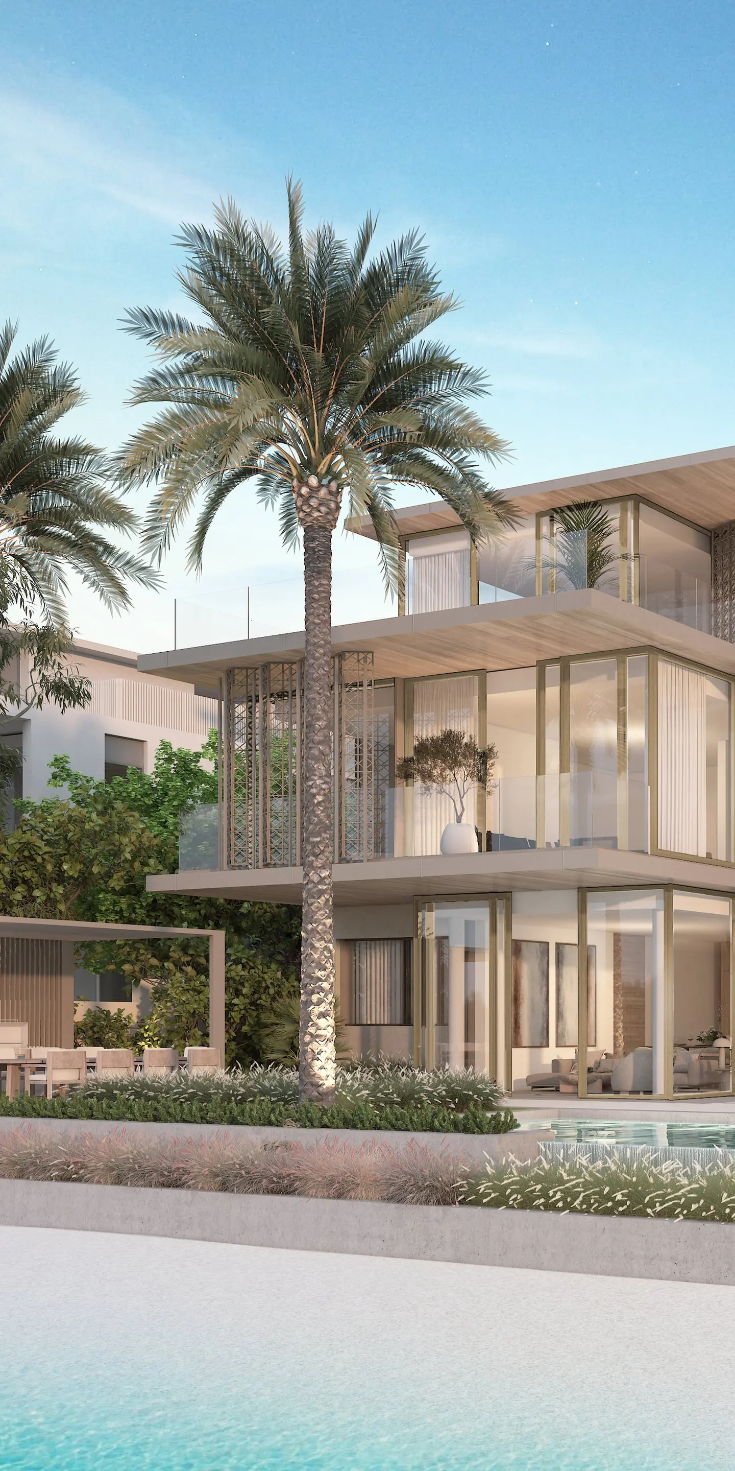 Villa Cyan Sky on Frond F: a pool terrace opening onto the beach at sunset